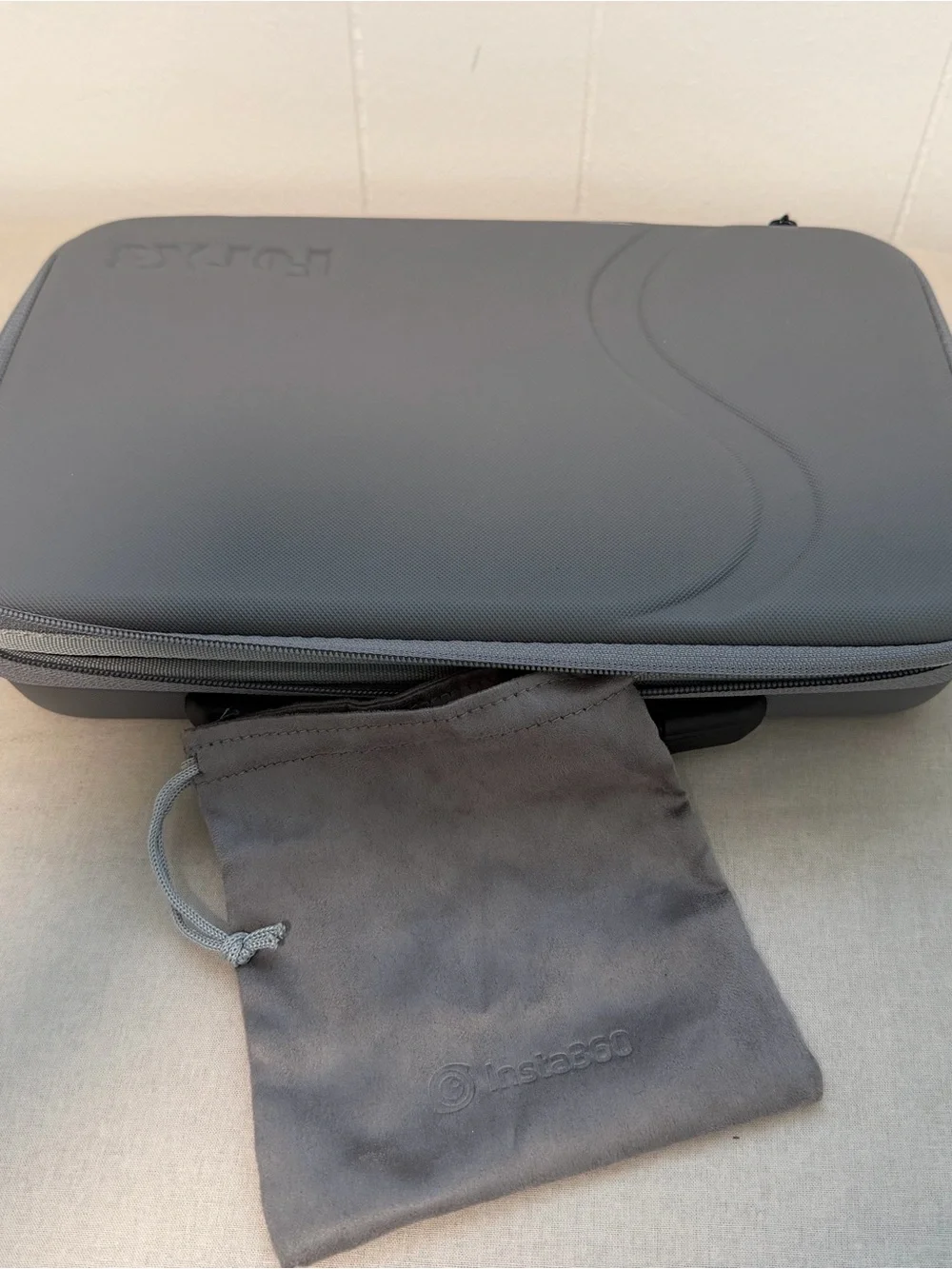 Insta360 X2 with accessories and case